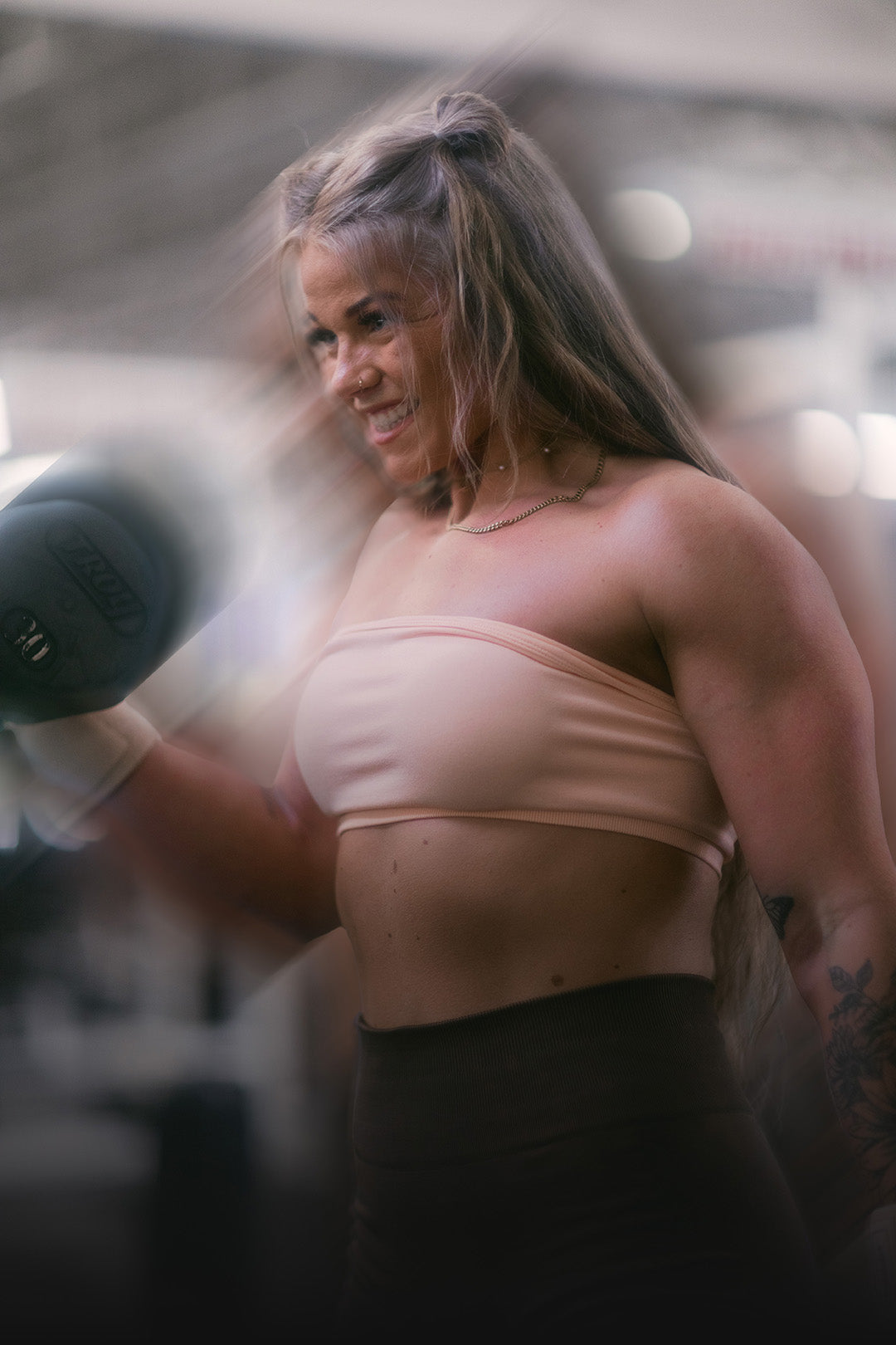 strong woman lifting weights